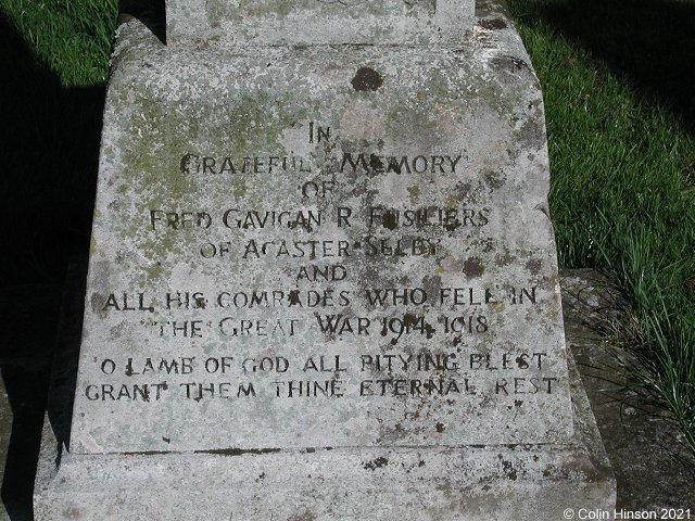 Photograph of the 1914-1918 War Memorial in Acaster Selby Churchyard.