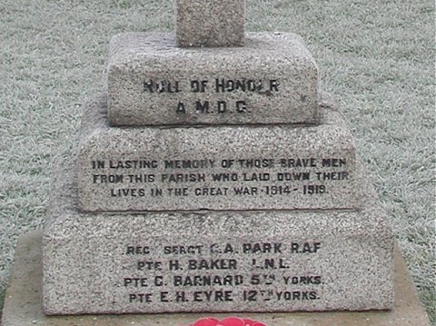 The 1914-18 War Memorial on the green near Burton Fleming Church.