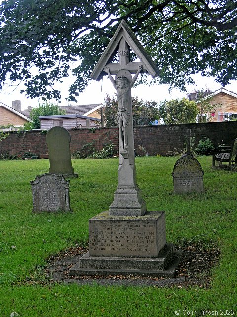 Photograph of the War Memorial in Dunnington Churchyard.