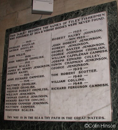 The Memorial plaque for Fishermen, on the wall of St Oswald's Church.
