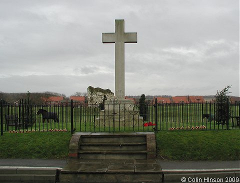 The World War I and II War Memorial in front of the castle at Flamborough.