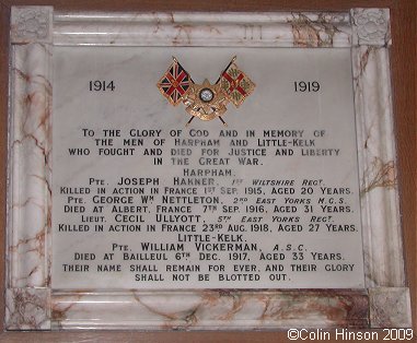 The World War I Memorial plaque in St. John's Church, Harpham.