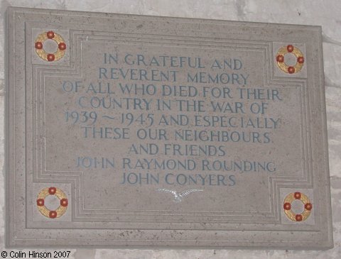 The World War II Memorial Plaque in St. John's Church, Harpham.