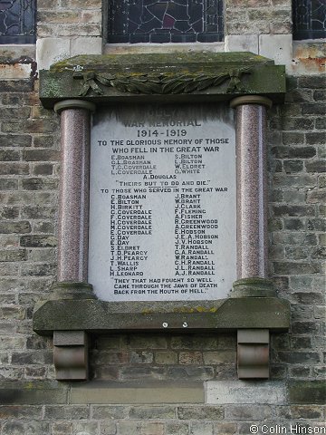 The 1914-1918 War Memorial on the outside wall of St. Nicholas' church.