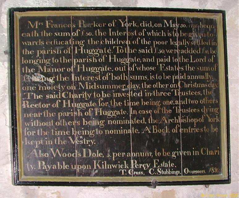 The Barker Benefaction plaque in St. Mary's Church, Huggate.