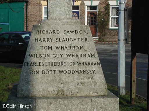 The 1914-19 and 1939-45 War Memorial on Langtoft village green.