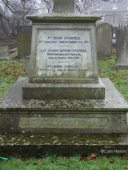 The 1914-1919 and 1939 to 1945 War Memorial in the churchyard at Muston.