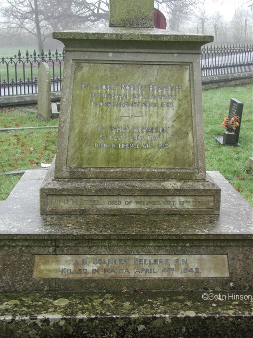 The 1914-1919 and 1939 to 1945 War Memorial in the churchyard at Muston.