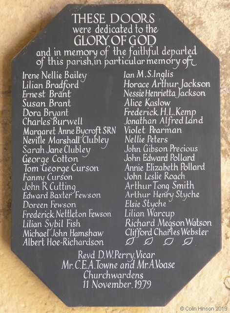 The Dedication plaque in the door way of St. Augustine's Church, Skirlaugh.
