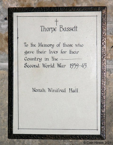 The WWII Memorial plaque in Thorpe Bassett church.
