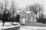 Gatehouse to Aldby Park in the snow