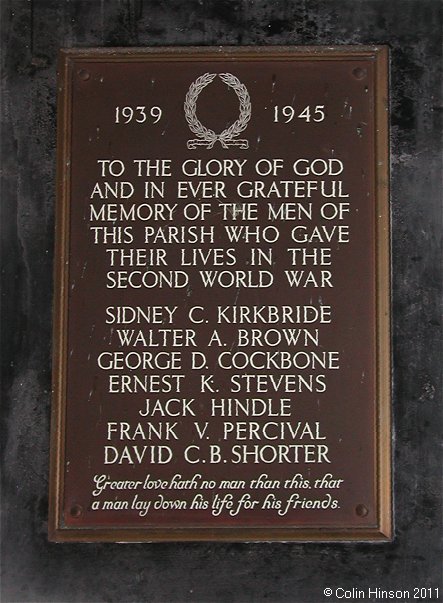 The World War II Memorial plaque in St. Oswald's Church, Askrigg.