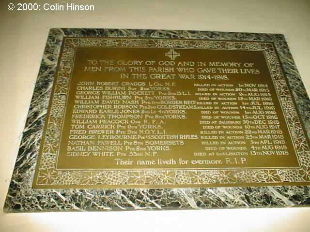 The 1914-18 and 1939-45 Memorial plaques in the Church at Bolton on Swale.