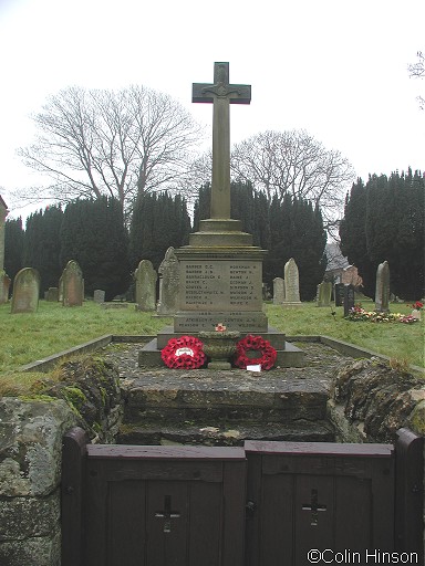 The 1914-18 and 1939-45 War Memorial in the Churchyard at East Ayton.