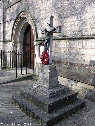 The World War I Memorial plaque in front of St. Hedda's Church, Egton Bridge.