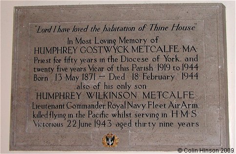 The Memorial Plaque to the Vicar and his son in St. Felix's Church, Felixkirk.
