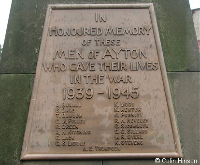 The the War Memorial in the churchyard at Great Ayton.