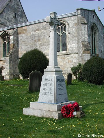 The War Memorial in All Saints' Churchyard at Huntington.