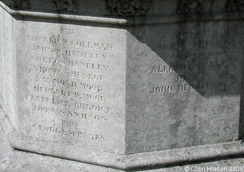 The World Wars I and II War Memorial in the Churchyard at Masham.