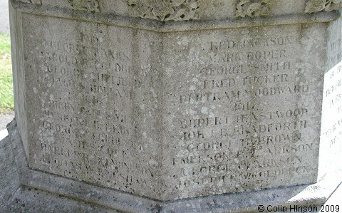 The World Wars I and II War Memorial in the Churchyard at Masham.