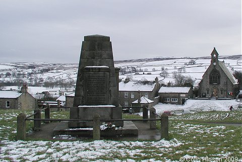 The World Wars I and II War Memorial on the green at Reeth.