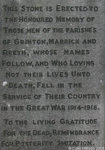 The World Wars I and II War Memorial on the green at Reeth.