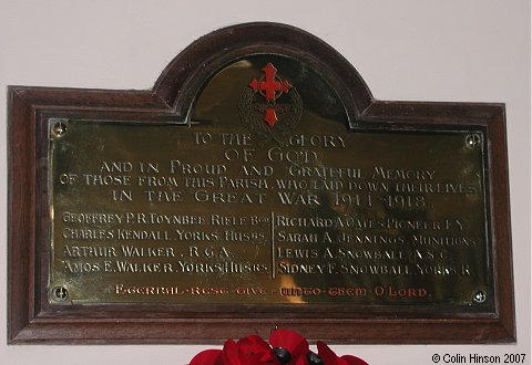The War Memorial plaque 1914-1918 in St. Mary's Church, Warthill.