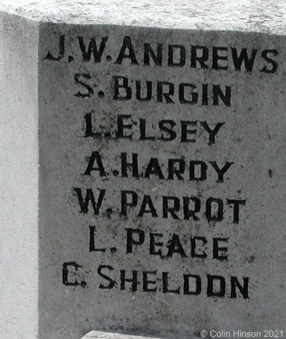 The 1914-18 and 1939-45 War Memorial in St. Philip and St. James' Churchyard, New Village.