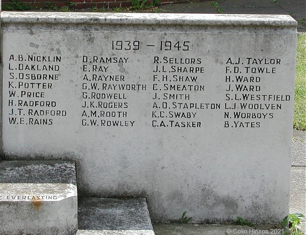 The 1914-18 and 1939-45 War Memorial in St. Philip and St. James' Churchyard, New Village.