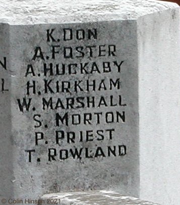 The 1914-18 and 1939-45 War Memorial in St. Philip and St. James' Churchyard, New Village.