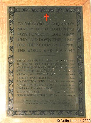 The World War II Memorial plaque in St. Oswald's Church, Collingham.