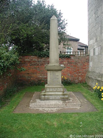 The World War I and II War Memorial in the churchyard at Great Ouseburn.