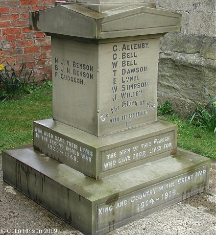 The World War I and II memorial in the churchyard at Great Ouseburn.