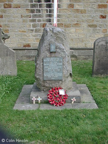 The War Memorial in the Churchyard at Grewelthorpe.