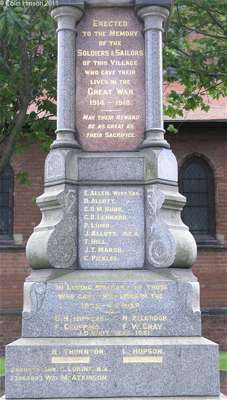 The War Memorial for the dead of WWI and WWII, and other wars, in front of St. Luke's Church Grimethorpe.