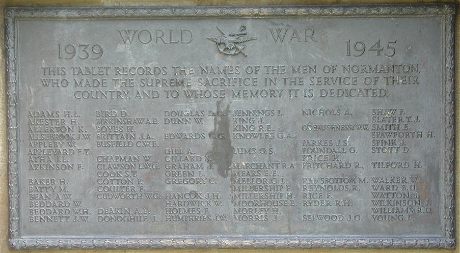 The War memorial and plaques at Normanton