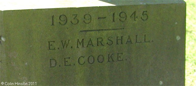 The War Memorial in All Saint's Churchyard, Saxton.