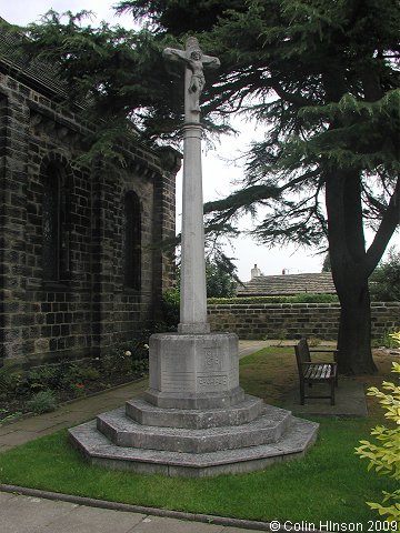 The World War I War Memorial in the churchyard at Shadwell.