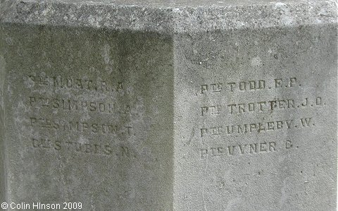 The World War I War Memorial in the churchyard at Shadwell.