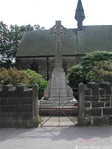 The World War I War Memorial in the churchyard at Sharlston.