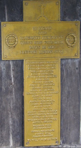 The World War II Memorial plaque in the Lych Gate at St. Mary's Church, Whiston.