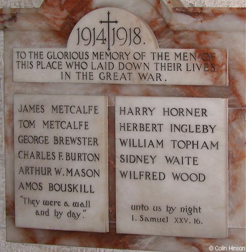 The War Memorial plaques in St. Cuthbert and St. Oswald's Church, Winksley.