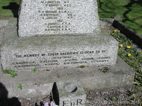 The War Memorial in All Saints' Churchyard, Wistow.